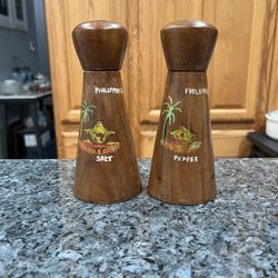 Vintage Philippine Island Hand Painted Wood Pair of Salt & Pepper Shakers.  Preowned some minor paint wear.  Size approximately 6 1/4 inches tall.  Ha