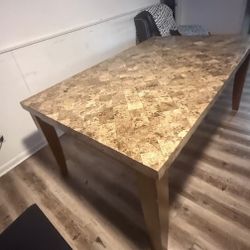 Marble dinning table with wooden legs 70"x42"x 31" new in condition|