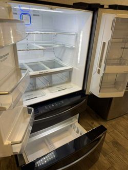 LG black stainless steel 4 door French door fridge with extra door in door warranty included