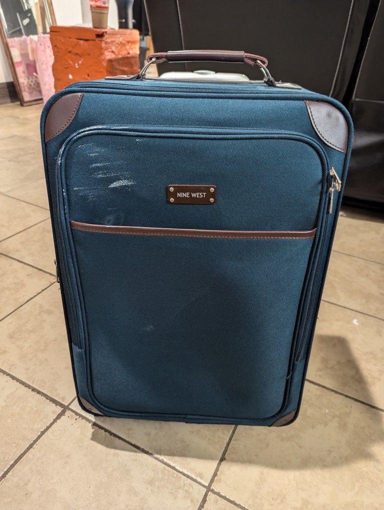 Green suitcase luggage carry on
22x14x8