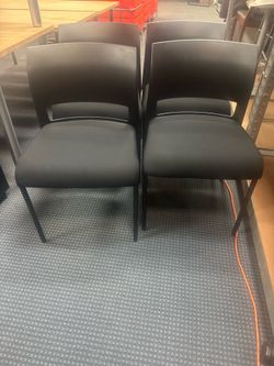 Stackable chairs by Steelcase