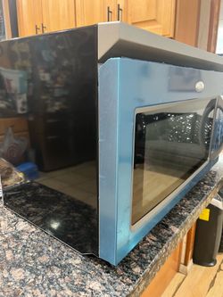 New Microwave 1.6 cu Ft. Over The Range