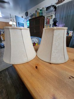 Pair of stifle.Cream Fabric Lamp Shades