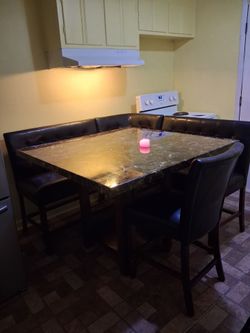 Marble table w/ chairs and connecting benches