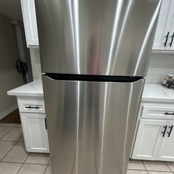 LG Stainless Steel Fridge 68 inch high,  31 inches in depth ,33 wide