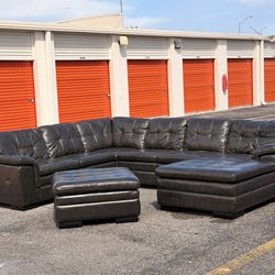 Beautiful huge leather sectional couch with ottoman
