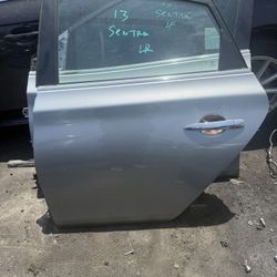 2013 Nissan Sentra, Left Rear Door $220 silver color