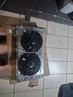 Performance Radiator with fans length  is 36" width  is26"