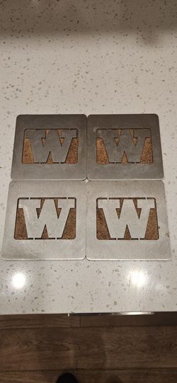 SET OF. 4. U of W COASTERS