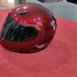 FOUR MOTORCYCLE HELMETS