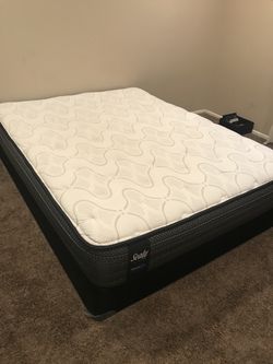 Brand new Sealy queen mattress set