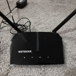 NETGEAR AC1000 WiFi Router (Model R6080)