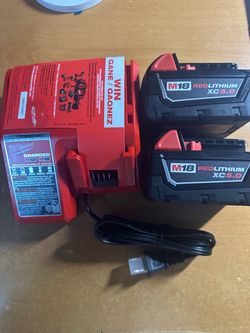 Milwaukee charger and  Batteries 5.0
