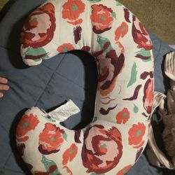 Nursing pillow with red flowers