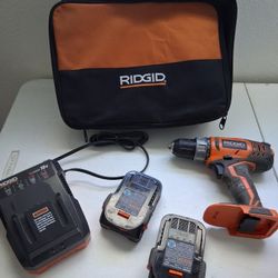 Rigid Drill With 2 Batteries Charger And Bag