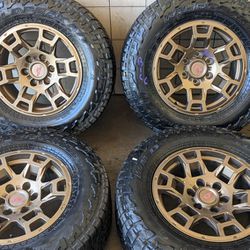Toyota 4 Runner Gold Aftermarket Rims And Tires 17 Inch Mud Tires 