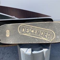 Decender Vintage Skateboard On Tracks