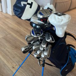 Assortment Of Junior Clubs With Nike Bag