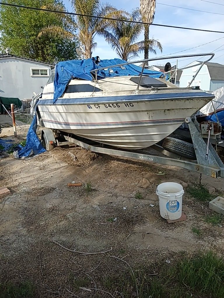 21 ft Bayliner and Trailer as is.Inboard Outboard