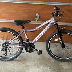 24 inch Kids mountain bike with front shock fork and 21 speed like new