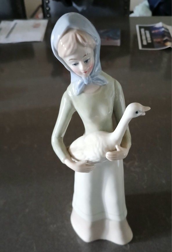 Beautiful  Figurine Woman Holding Geese