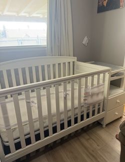 Crib with changing table and mattress