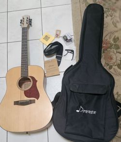 Guitar, dreadnought style 6 string with a full package NEW