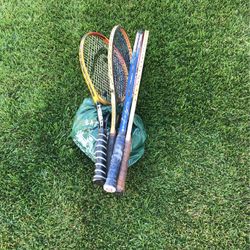 tennis rackets  and tennis balls 