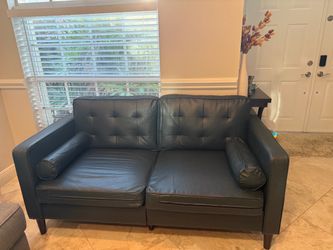 Blue Tufted Loveseat with Bolster Pillows