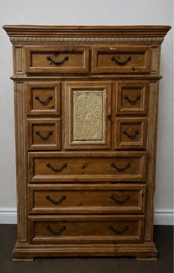 Tall Wood Dresser with Ornate Detail