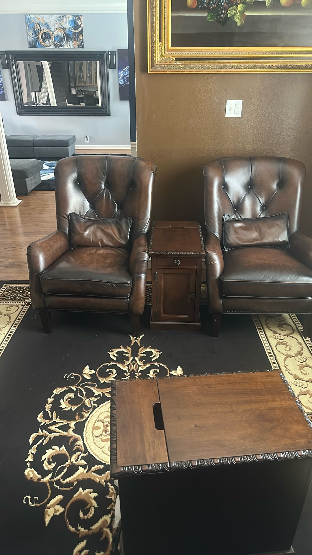 2 Leather Chairs And 1 Table