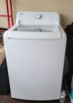 LG Washer machine LIKE NEW high Efficiency  top load washer, slam proof  glass.
