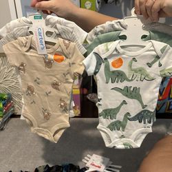 18 Carters And Huggies Body Suits 