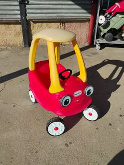 Little tikes cozy coupe with gas cap and key wheels and push handle