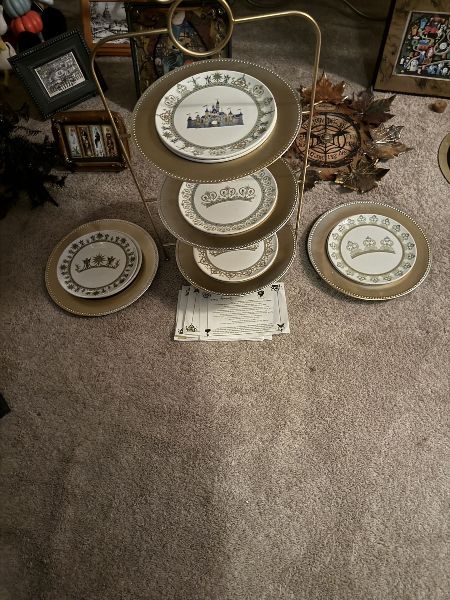 Disneyland Eight Collectible plates with documentation, sign, and numbered in a beautiful gold Stan