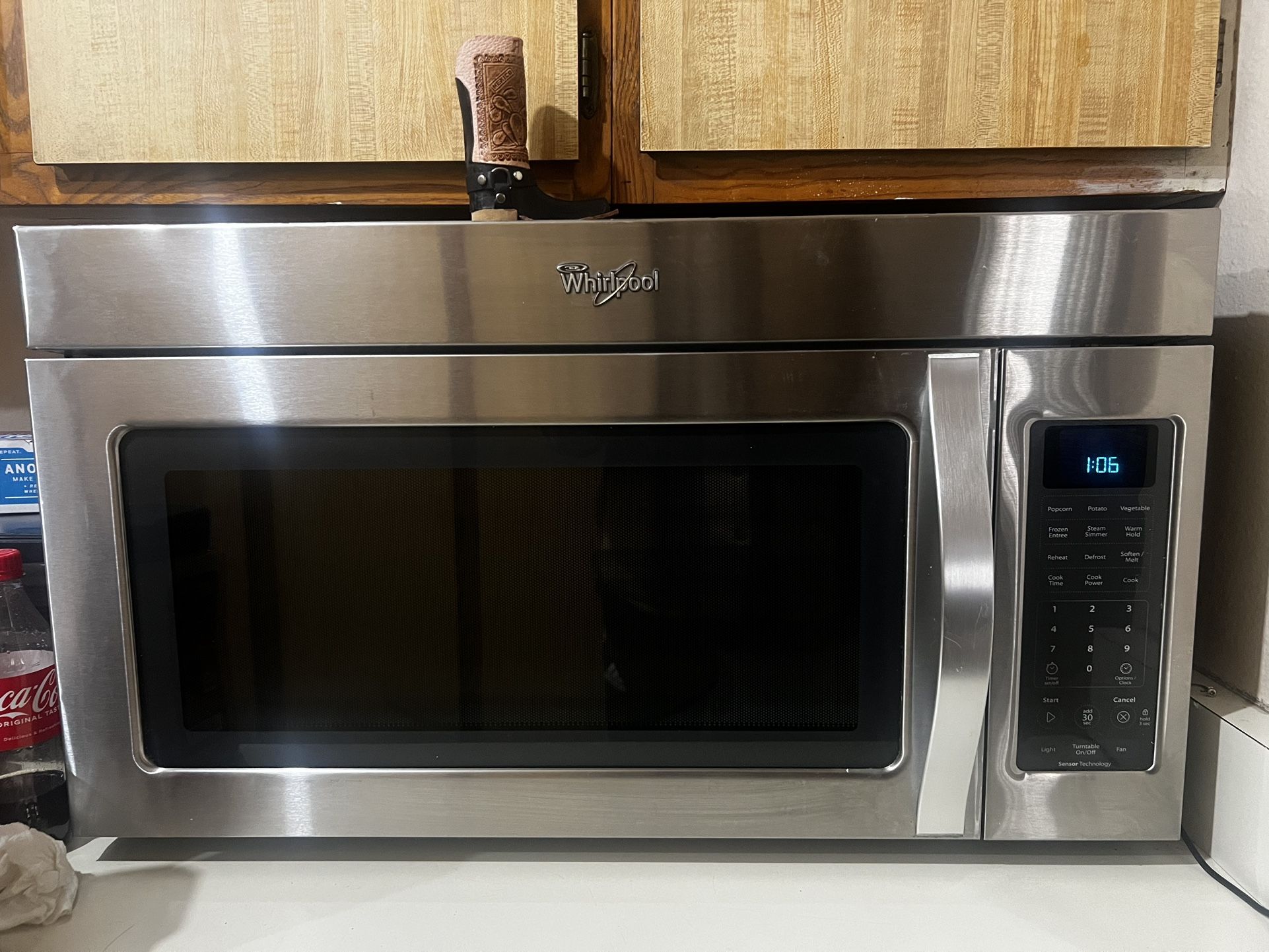 Whirlpool Over The Range Microwave Black on Stainless with 1.9 cu. ft. capacity, 3 speed fan, 10 level variable cooking and control lock out