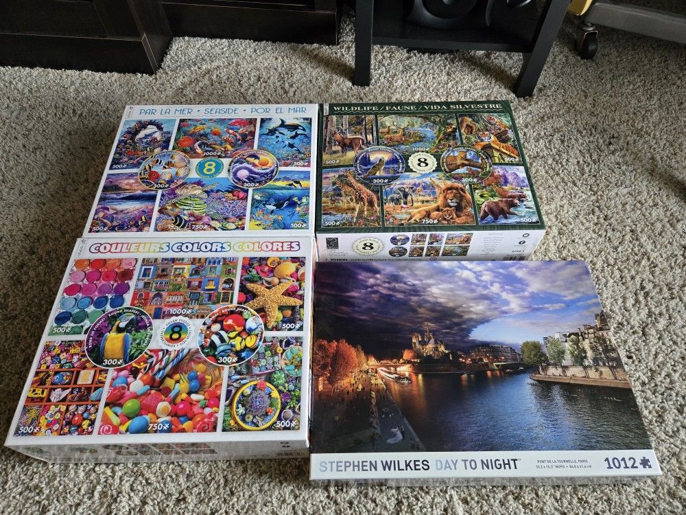 4 Boxes Of Puzzles
