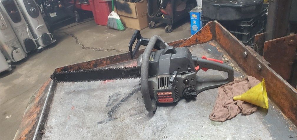 Grey Craftsman Chain Saw