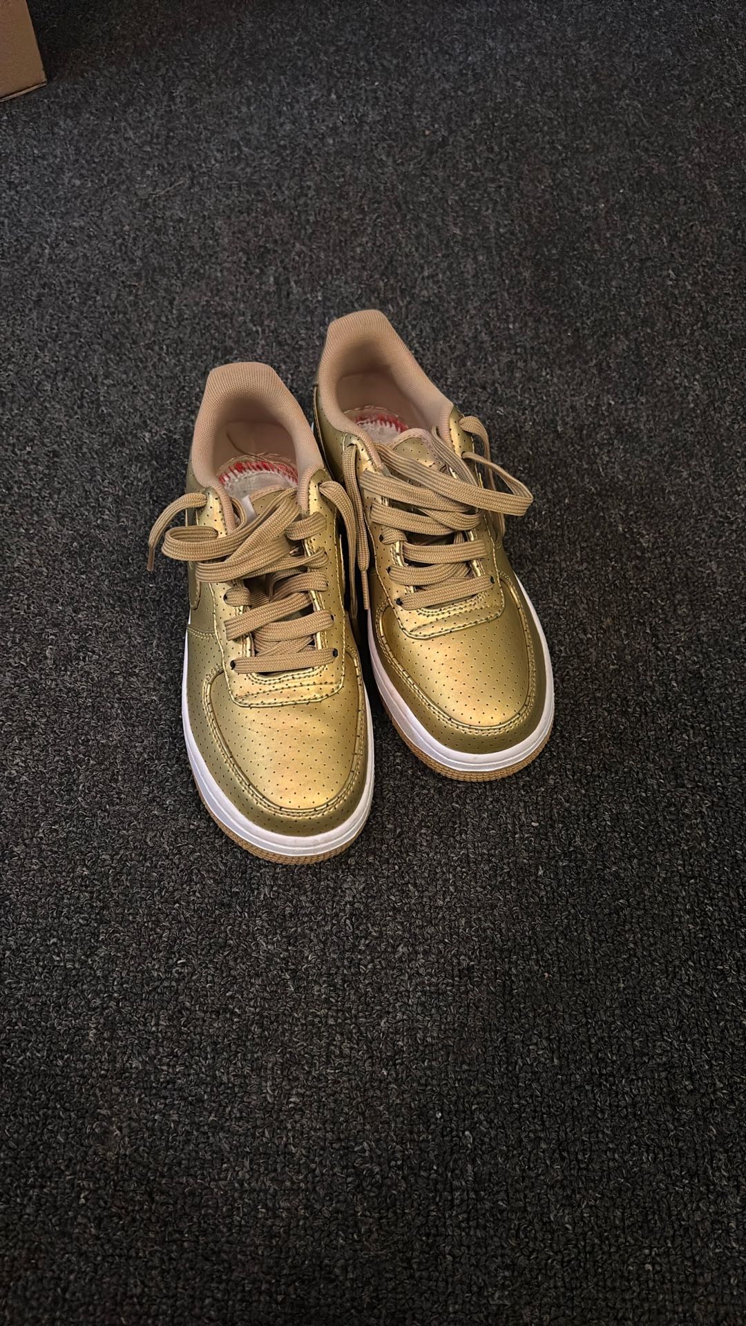 Gold Nikes