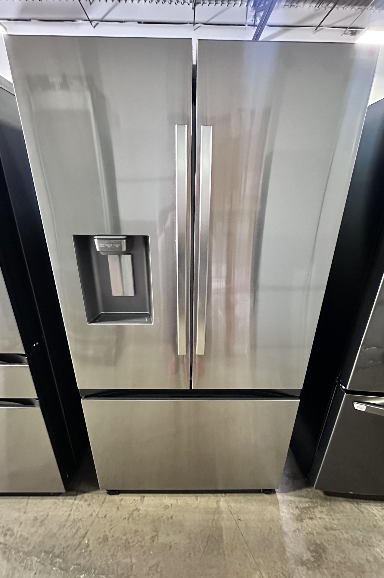 New Fingerprint Resistant Stainless Steel Samsung 31 cu. ft. 3-Door French Door Smart Refrigerator