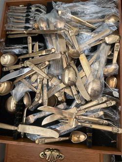 Thailand bronze set still in plastic