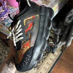 Versace Chain Reacts