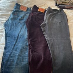 Two pairs of Levi’s one pair of Michael Kors