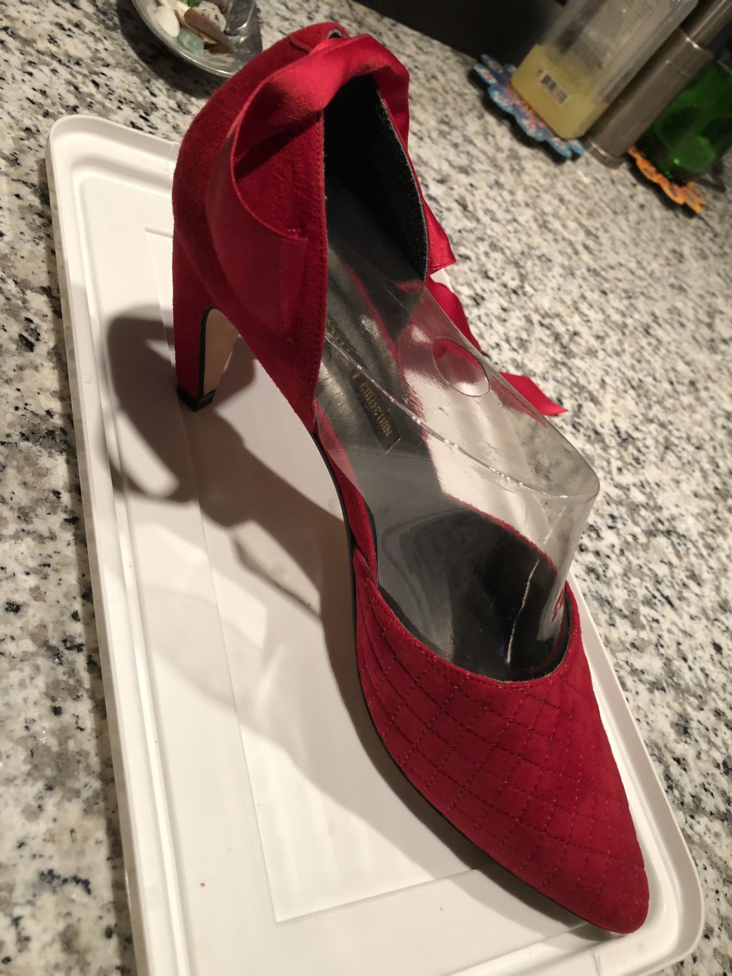 Red pumps with satin ribbon
