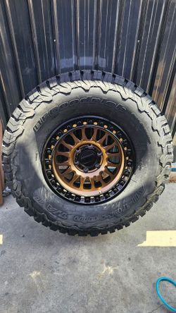KMC IMS 552 bronze wheels 315/70R17 Bfgoodrich KO2's 17x8.5