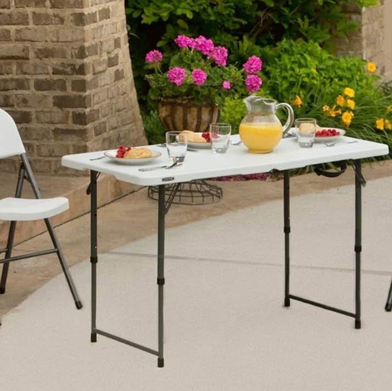 4 foot adjustable fold in half folding table - NEW