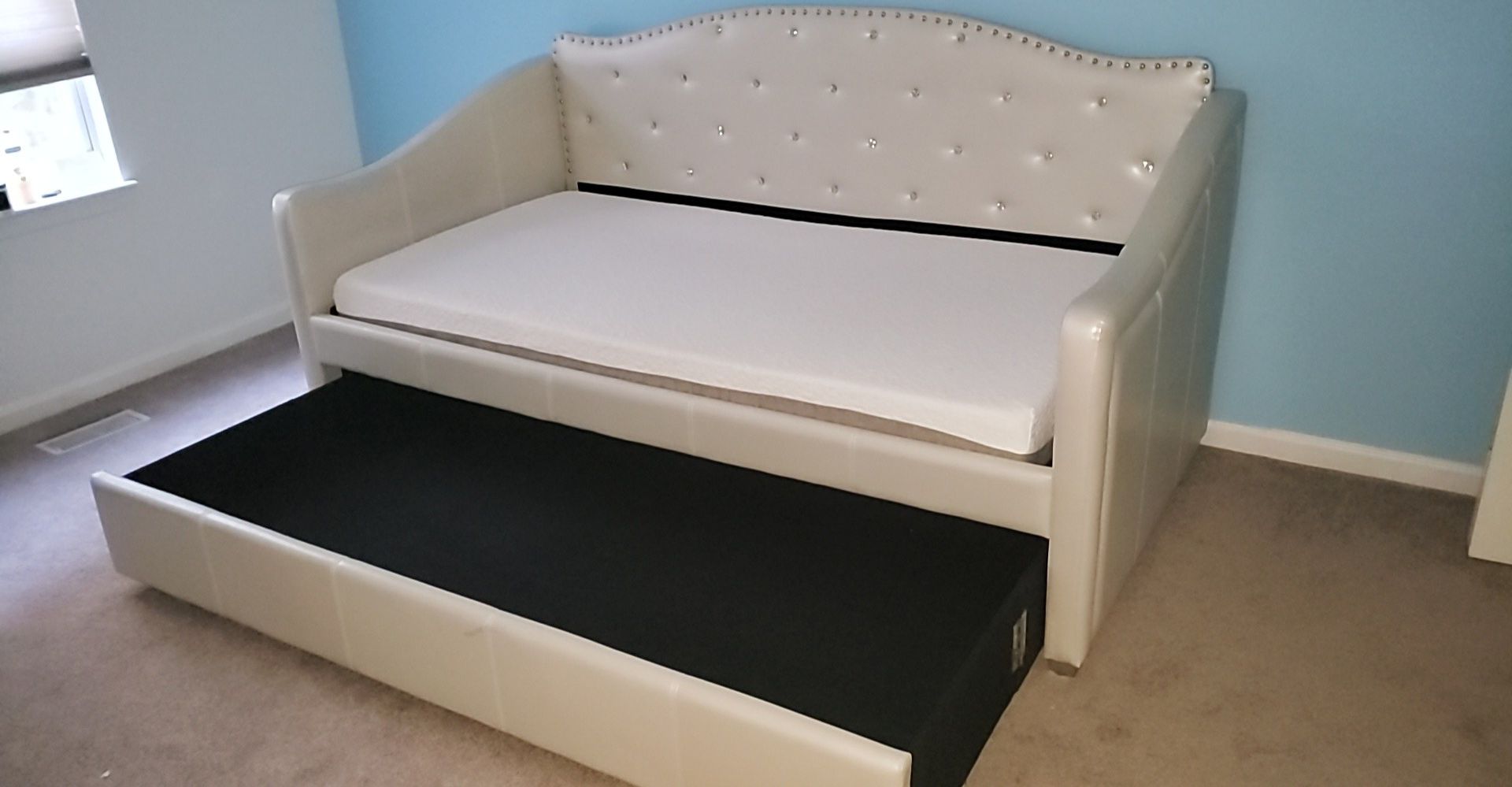 Twin size bed with trundle