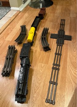 Vintage Lionel Toy Train Set with Locomotive, Cars, and Track