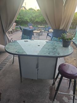 Patio bar. Outdoor bar. And chairs