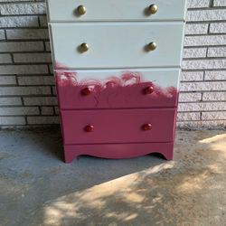Small pink and white dresser
